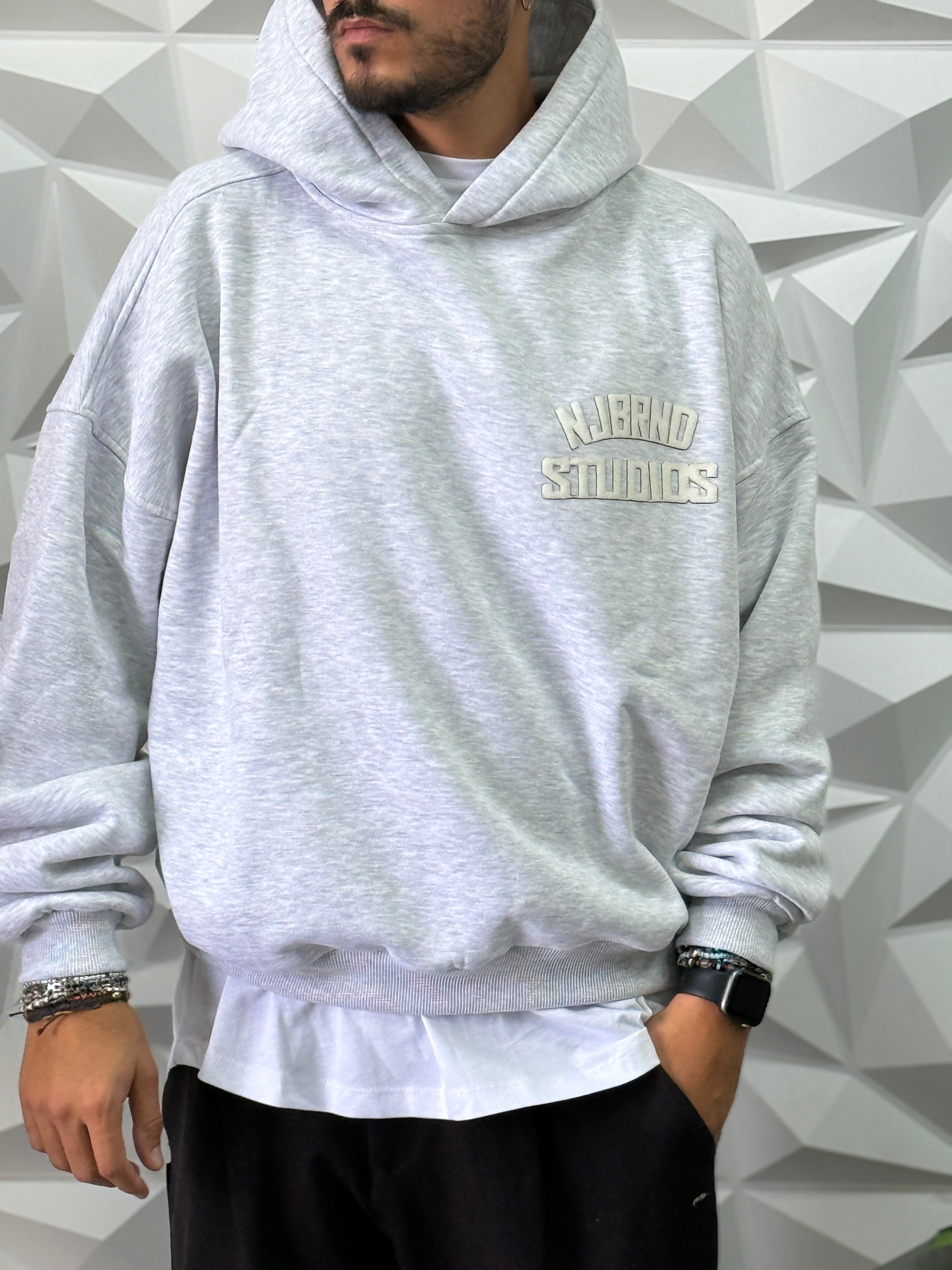 Felpa oversize grigia cappuccio studios New job brand