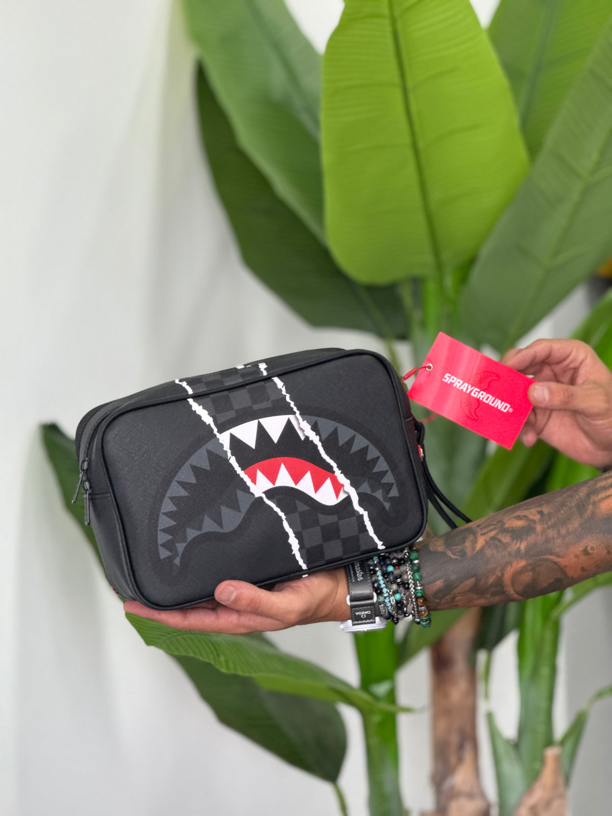 SPRAYGROUND Pochette center rip revealing check toiletry brick grigio/nero