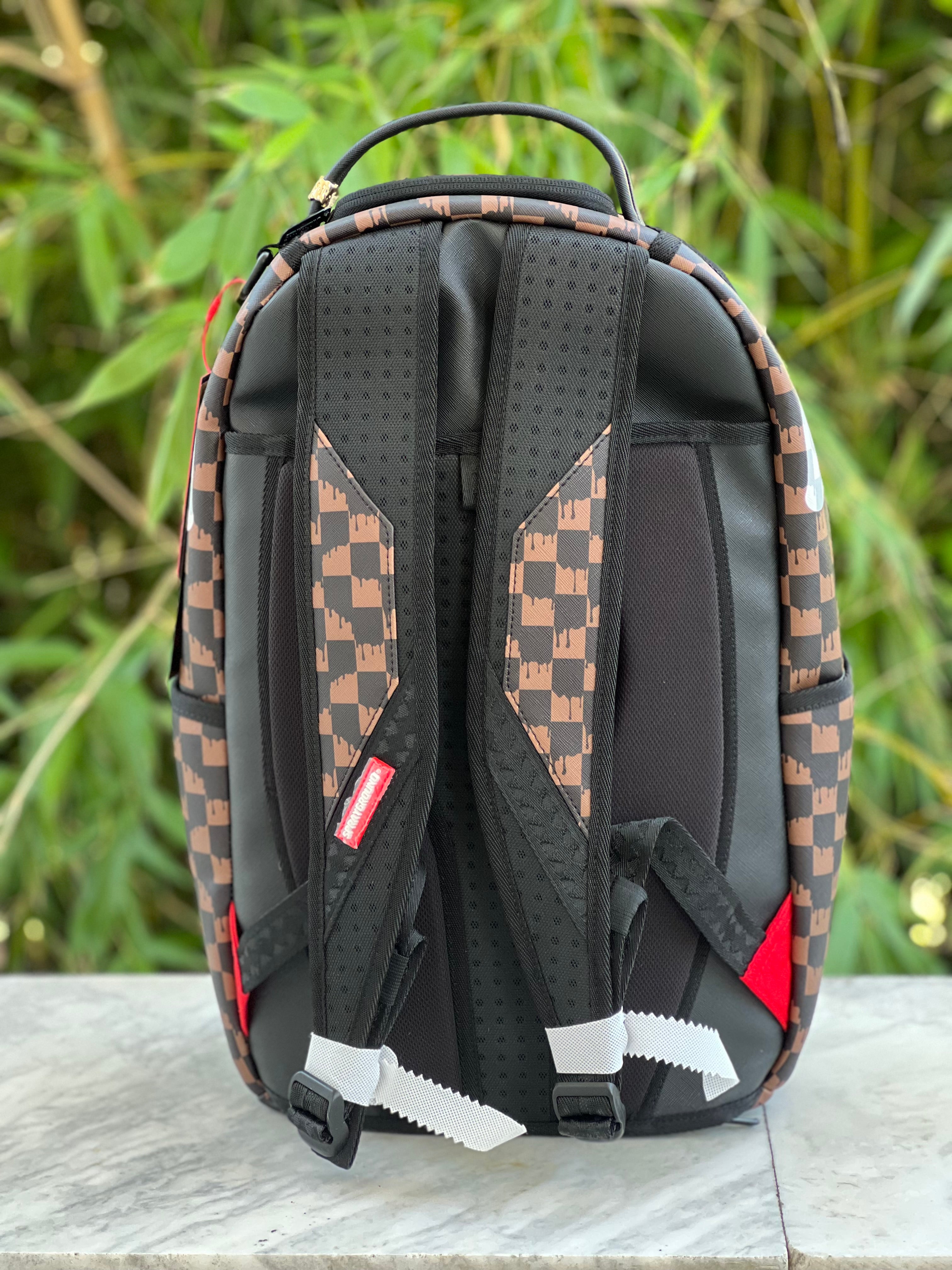 ZAINO SPRAYGROUND BROWN AND CREAM DRIP CHECK