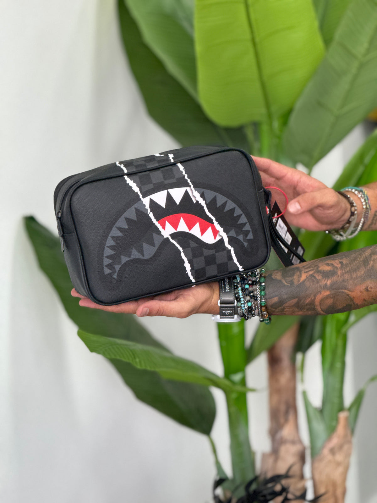 SPRAYGROUND Pochette center rip revealing check toiletry brick grigio/nero