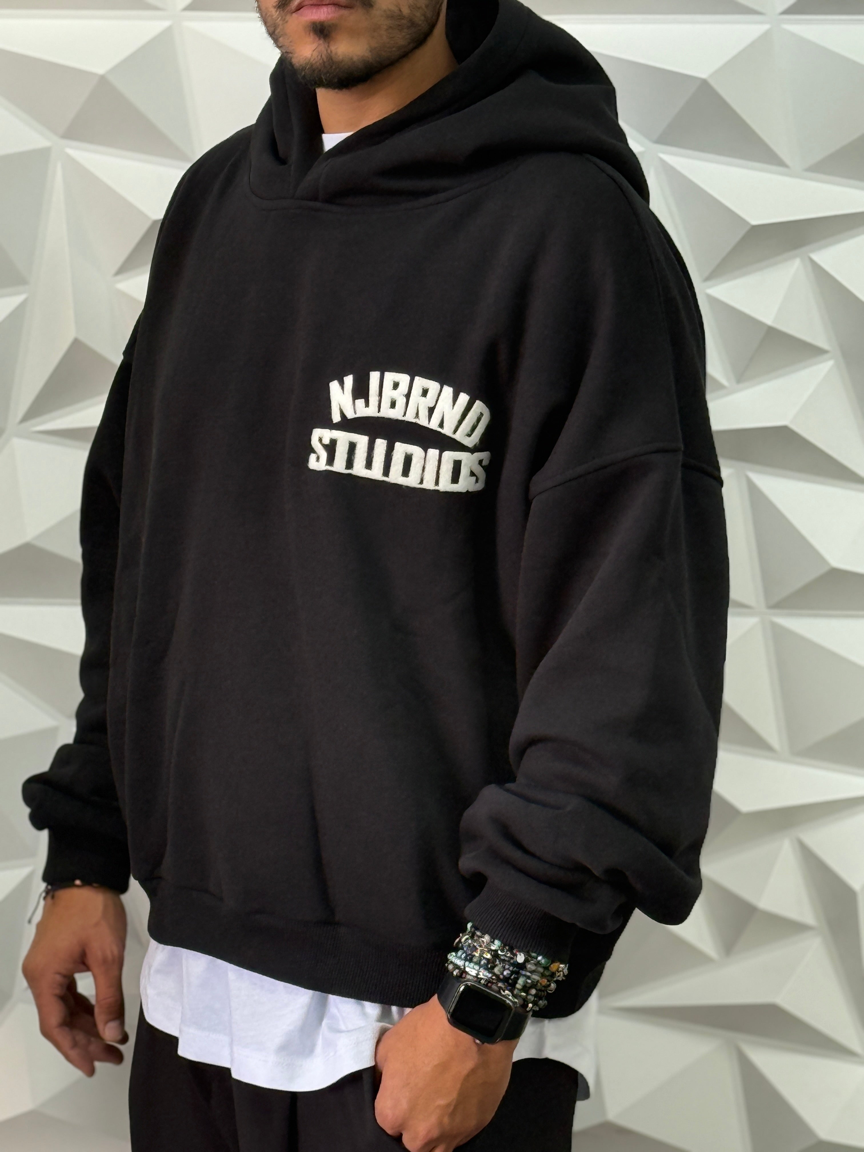 Felpa oversize nera cappuccio studios New job brand