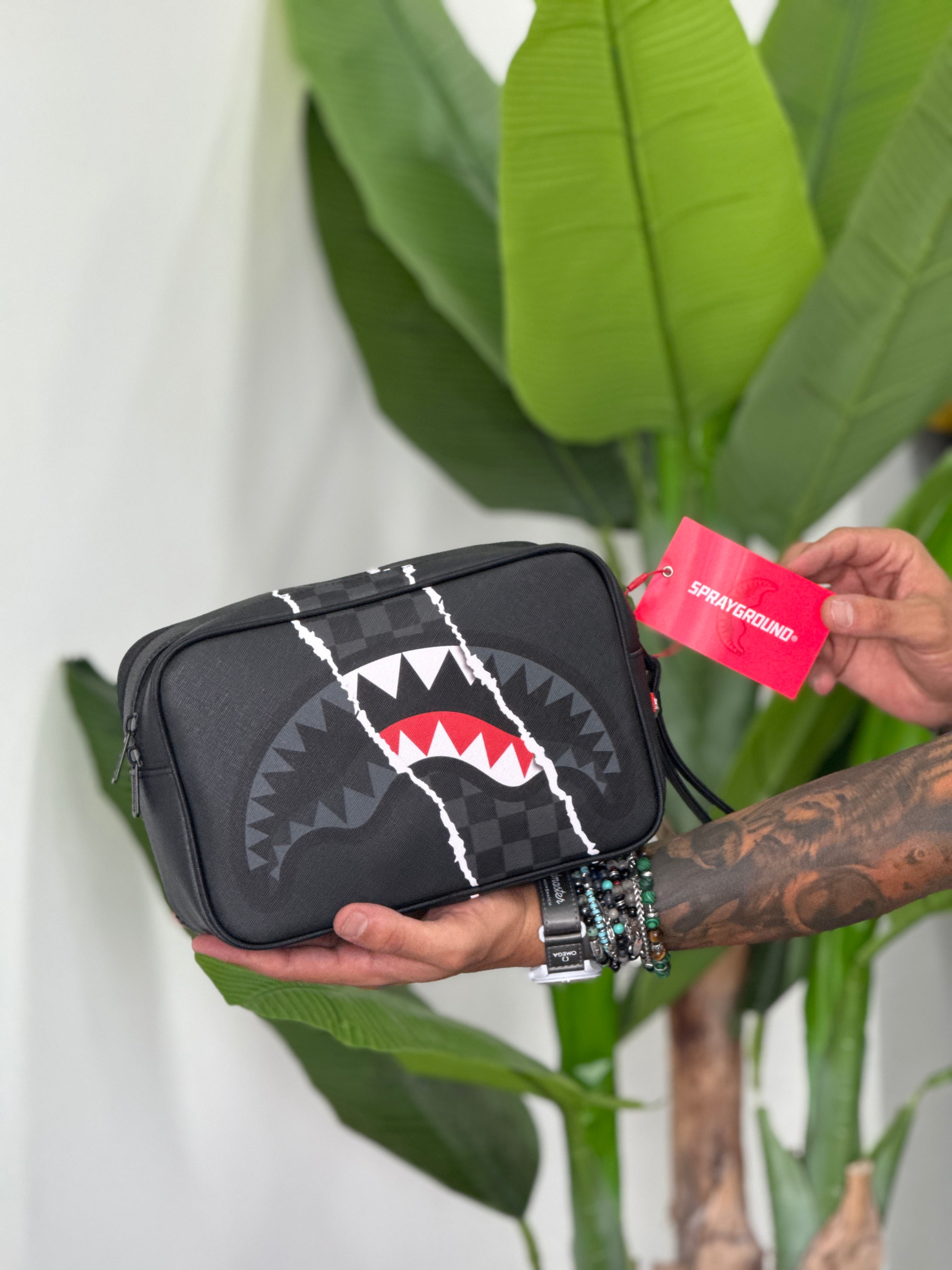 SPRAYGROUND Pochette center rip revealing check toiletry brick grigio/nero